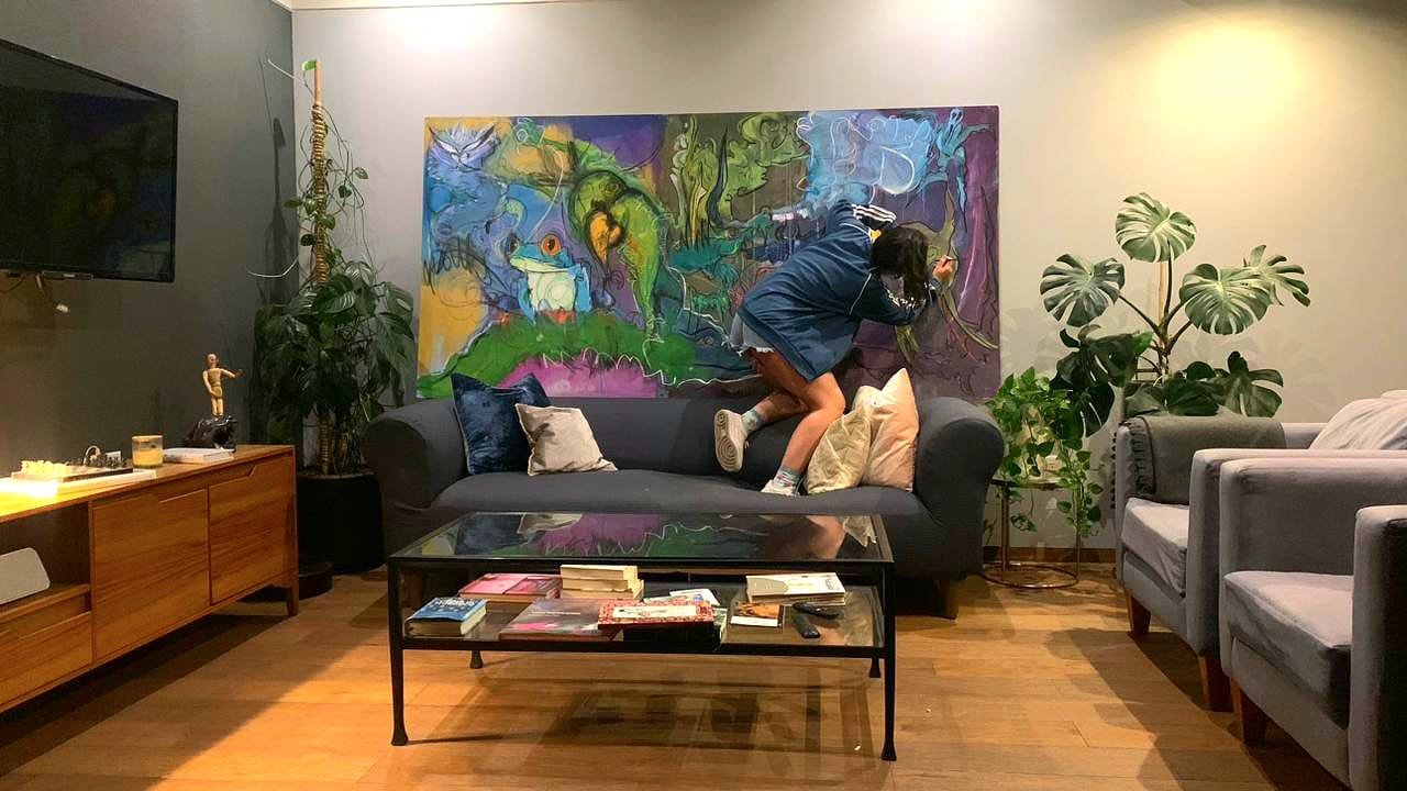Mariate Vaz painting in her studio